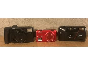 Lot Of 3 Cameras In Cases