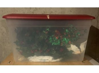 Storage Tote Filled With Faux Floral Christmas Items