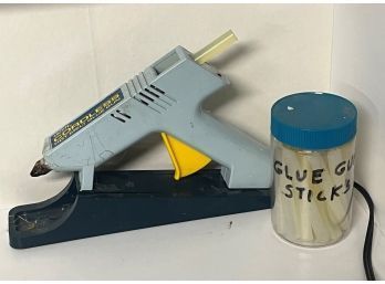 Cordless Glue Gun And Jar Full Of Glue Sticks