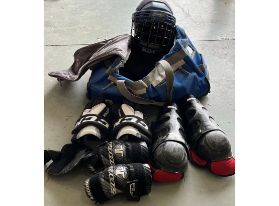 Hockey Set - Duffel Bag, Helmet And Various Pads.