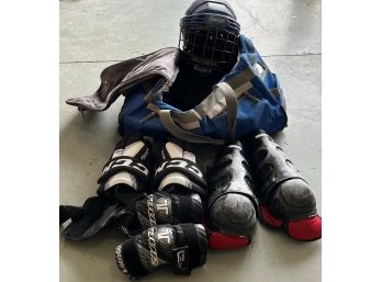 Hockey Set - Duffel Bag, Helmet And Various Pads.