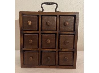Wooden Curio With 9 Drawers