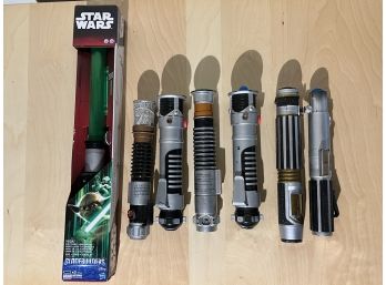 Grouping Of Star Wars Lightsaber Toys