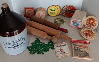 Group Of Collectibles: Assorted Beer Coasters & Napkins, Rolling Pins, Newer Jack Daniels Whiskey Jug,