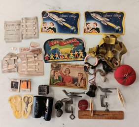 Group Of Sewing Collectibles: Atomic Needle Books, Traveling Sewing Items, Collar Stays, Sewing Birds