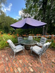 A Round Patio Table, 5 Chairs And Umbrella