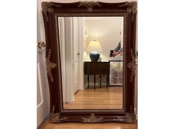 Huge Beveled Mirror In Ornate Mahogany Frame.
