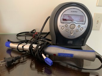CD Alarm Clock And Curling Iron