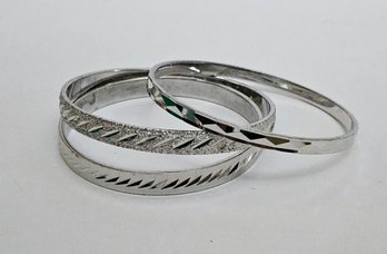LIKE NEW 1960s Monet Silvertone Etched Bangles