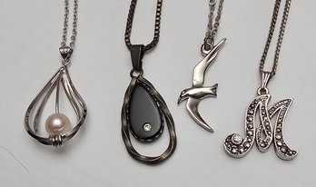 Silver Tone Necklace And Pendant Grouping