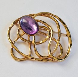 Large Gold Tone Abstract Brooch With Purple Cabochon