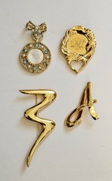 Vintage Gold Tone Brooches Including Trifari