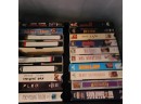 Huge Amount Of VHS And A Couple Dvds In Storage Containers