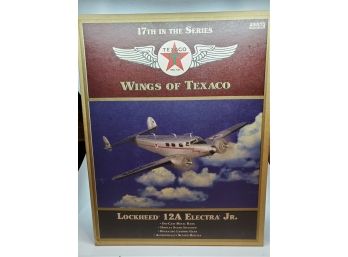 NIB Wings Of Texaco Lockheed Electra Jr. Bank