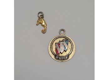 Vintage Buick And Seahorse Pendants
