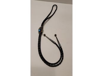 From The Gilbert Ortega Native American Galleries Sterling And Leather Shadow Bear Claw Bolo With Org Box