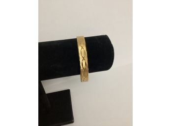 Signed Monet Gold Tone Etched Bangle Bracelet