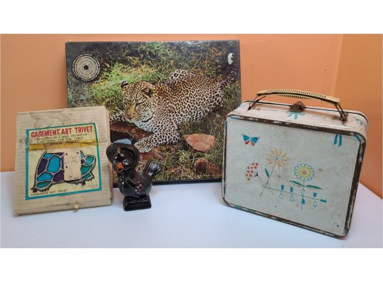 1972 New Cheetah Puzzle, Midcentury Turtle Trivet, Metal Lunchbox, And Ceramic Blackbird PICKUP ONLY
