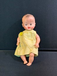 Baby Doll In Yellow Dress