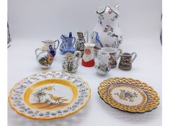Collection Of Hand Painted Portuguese Pitchers, Creamers, And Plates