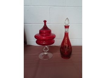Two Red Glass Containers