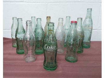 Group Of Coca-Cola Glass Bottle