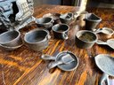 Assortment Of Cast Iron Pots And Stove