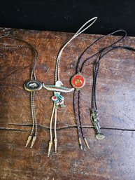 R119 - Lot Of Four  Costume Bolo Ties - 18'