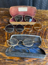 Four Sun Glasses With Cases
