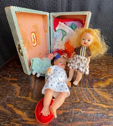Two Play Dolls With Clothes In Cass Case