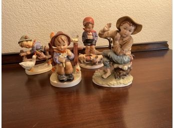 Set Of 4 Hummel Figurines