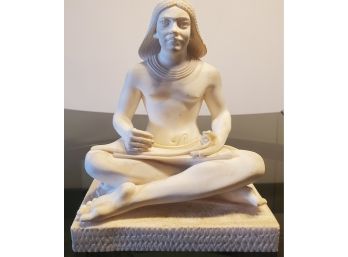 Sculpture Of A Man Cross-legged