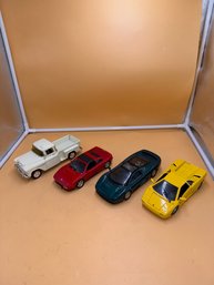Lot Of 4. 1:24 Scale Diecast Vehicles