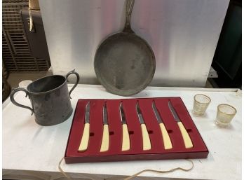 Cast Iron, Silver Cup, Steak Knives And Shot Glasses