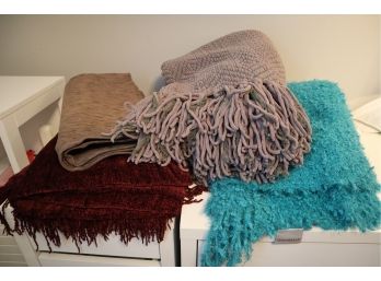 ASSORTMENT OF THROWS