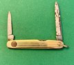 Small Gold Toned Remington Pocket Knife