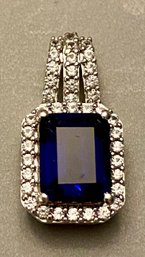 Sterling Silver, Lab Created Sapphire, And Natural Diamond Pendant