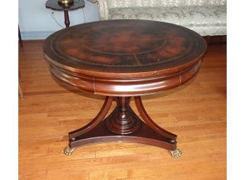 VINTAGE LEATHER TOP CLAW FOOT TABLE