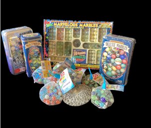 3 Tins, 1 Box And 9 Bags Of New Marbles