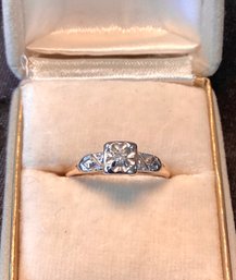 14 Kt White Gold Band With Small Diamond