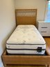 Lot #2 Of 2 Serena And Lily Rattan Twin Bed With Beauty Rest Black Mattress And Boxspring