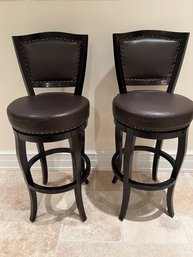 2 Pier 1 Brown Leather Swivel Barstools