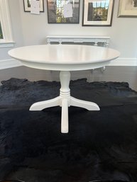 White Pedestal Round Table