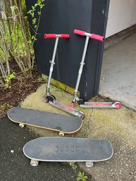Lot Of Razor Scooters And Skateboards