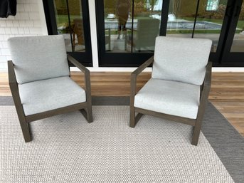 Pair Of Outdoor Arm Chairs With Grey Cushions