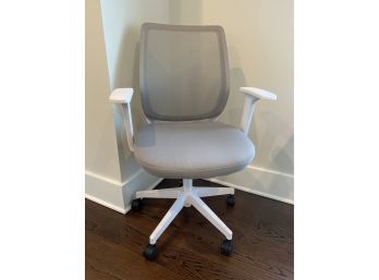 White And Grey Mesh Office Chair On Wheels