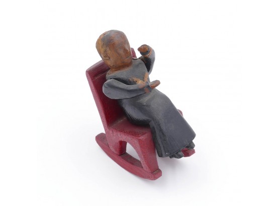 1870 Folk Art Carving Of A Woman On A Red Rocking Chair