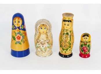 Russian Wooden Nesting Dolls - Three Different Sets And One Wooden Figure