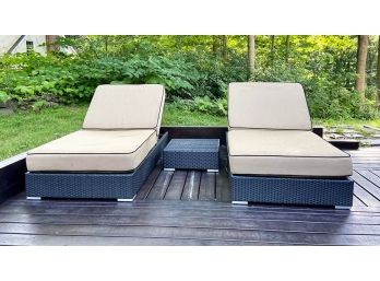 Pair Of Resin Wicker Outdoor Chaise Lounges And Side Table