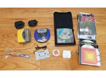 Vintage Sony Cassette Walkman, Aiwa Portable CD Player, Apple Ear Phones, CDs, Etc